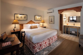 Premium bedding, down comforters, in-room safe, desk at Pinon Court By La Fonda