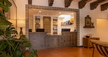 Hotel entrance and lobby at Pinon Court By La Fonda