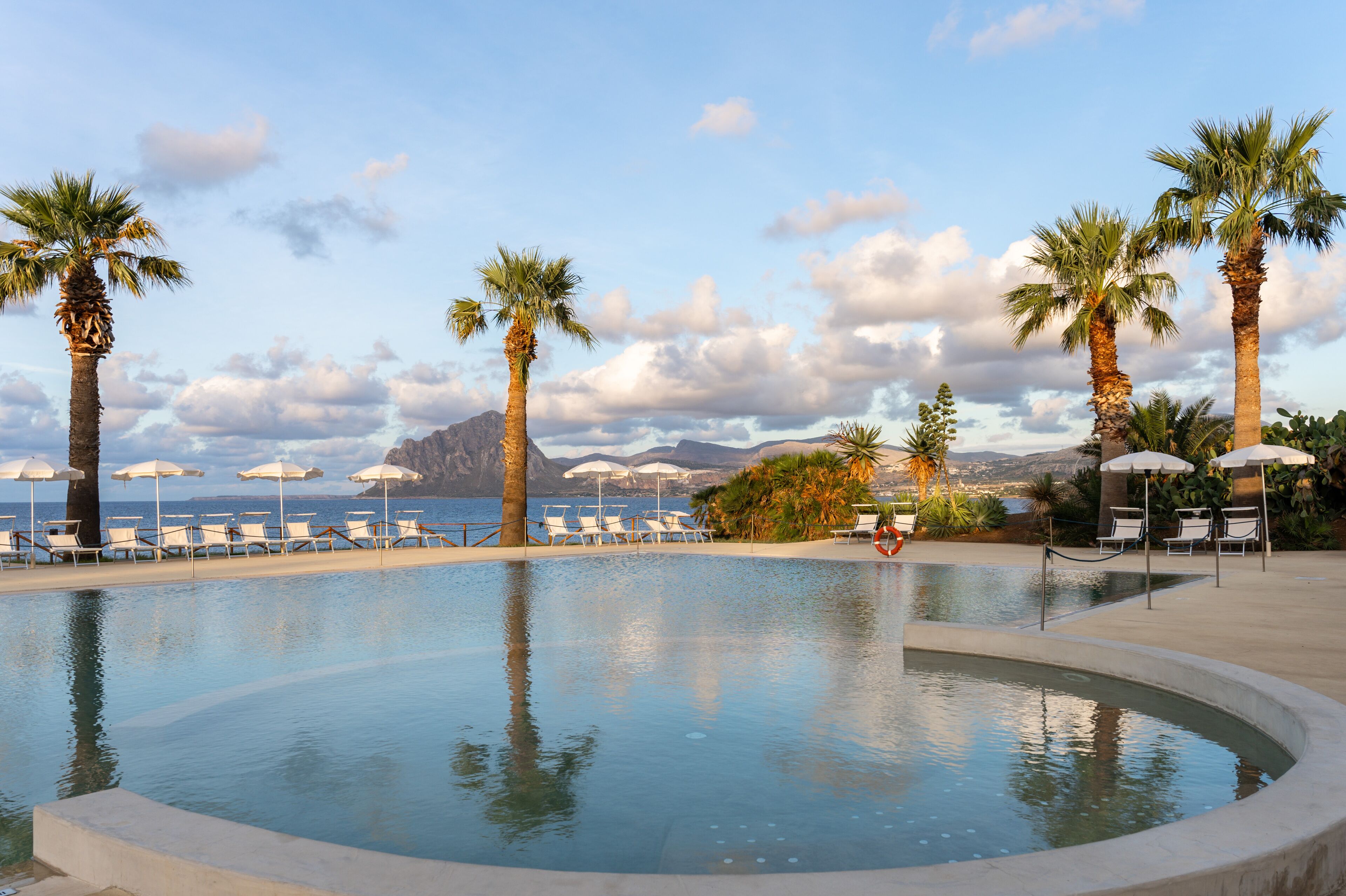 seasonal outdoor pool, pool umbrellas, pool loungers