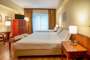 Memory-foam beds, minibar, in-room safe, desk