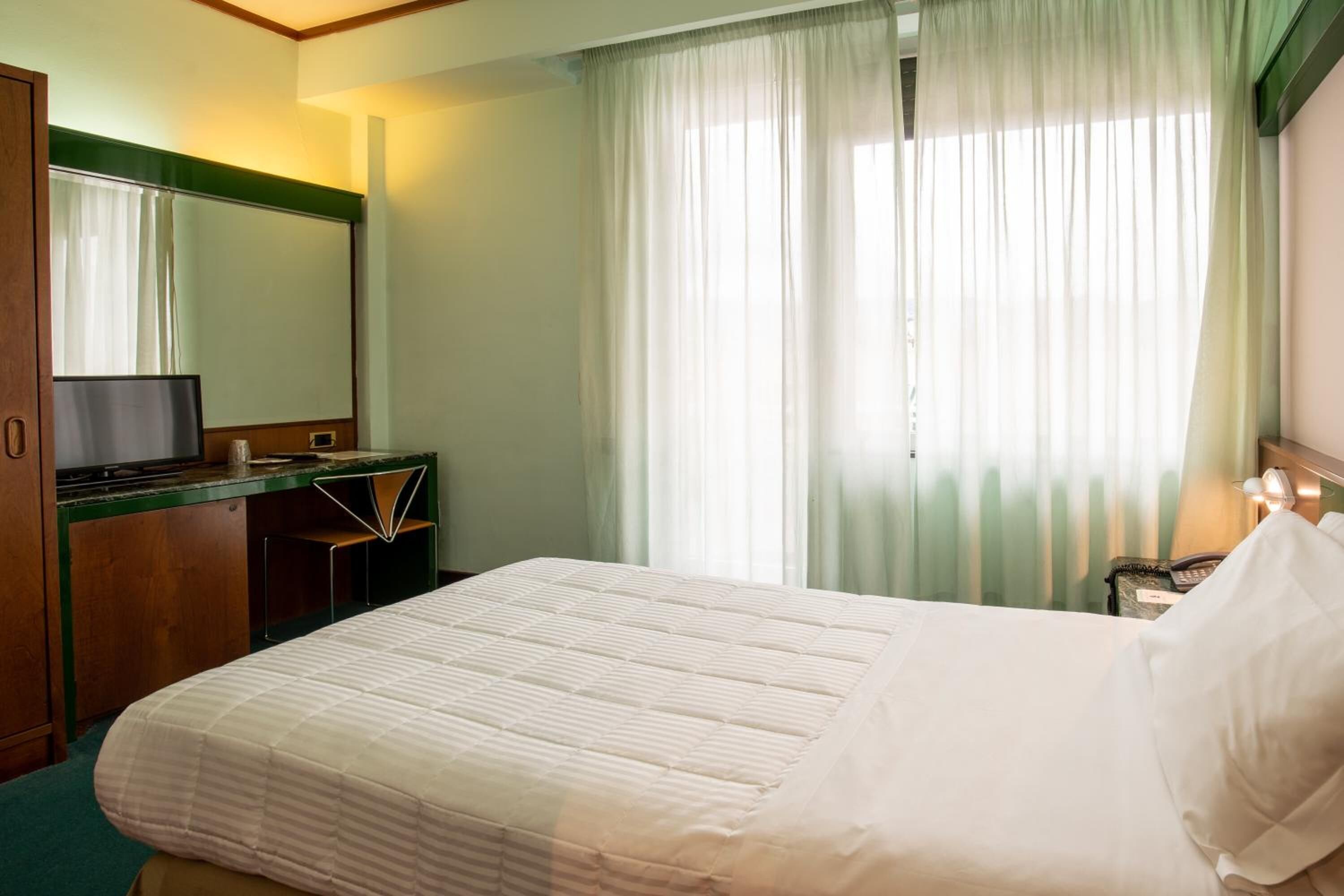 Memory foam beds, minibar, in-room safe, desk