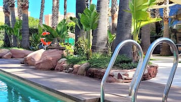 Seasonal outdoor pool, pool umbrellas, sun loungers