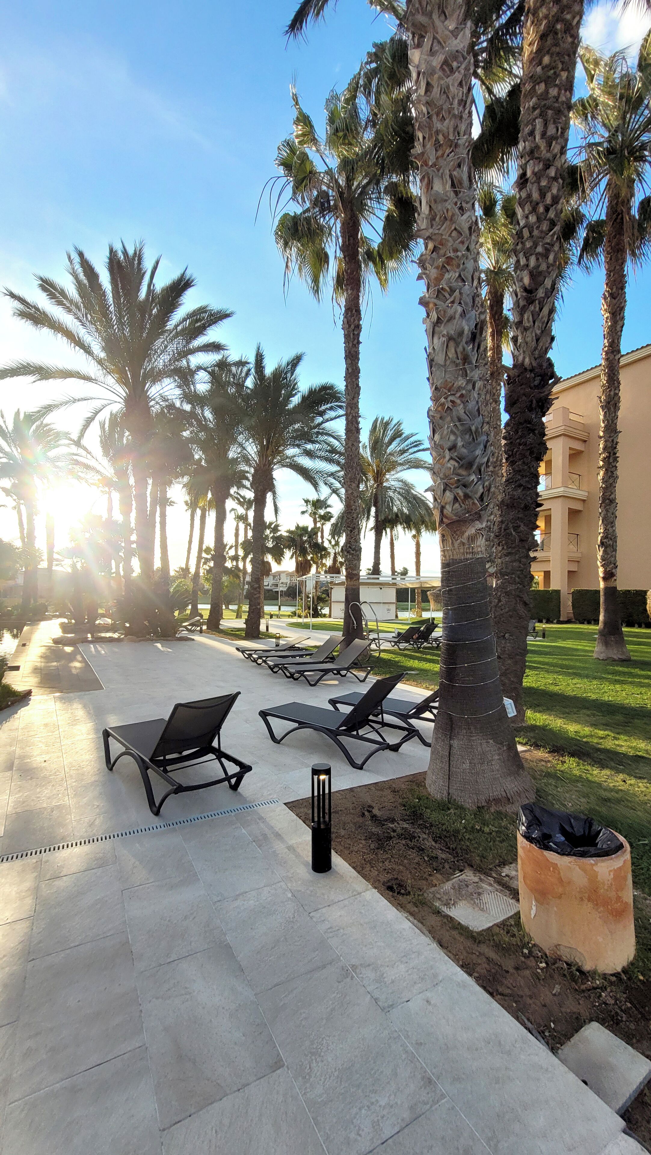 Seasonal outdoor pool, open 10:00 AM to 8:00 PM, pool umbrellas