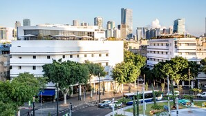A modern hotel with a flat facade, large windows, and a rooftop terrace. - Cinema Hotel - an Atlas Boutique Hotel (Tel Aviv)