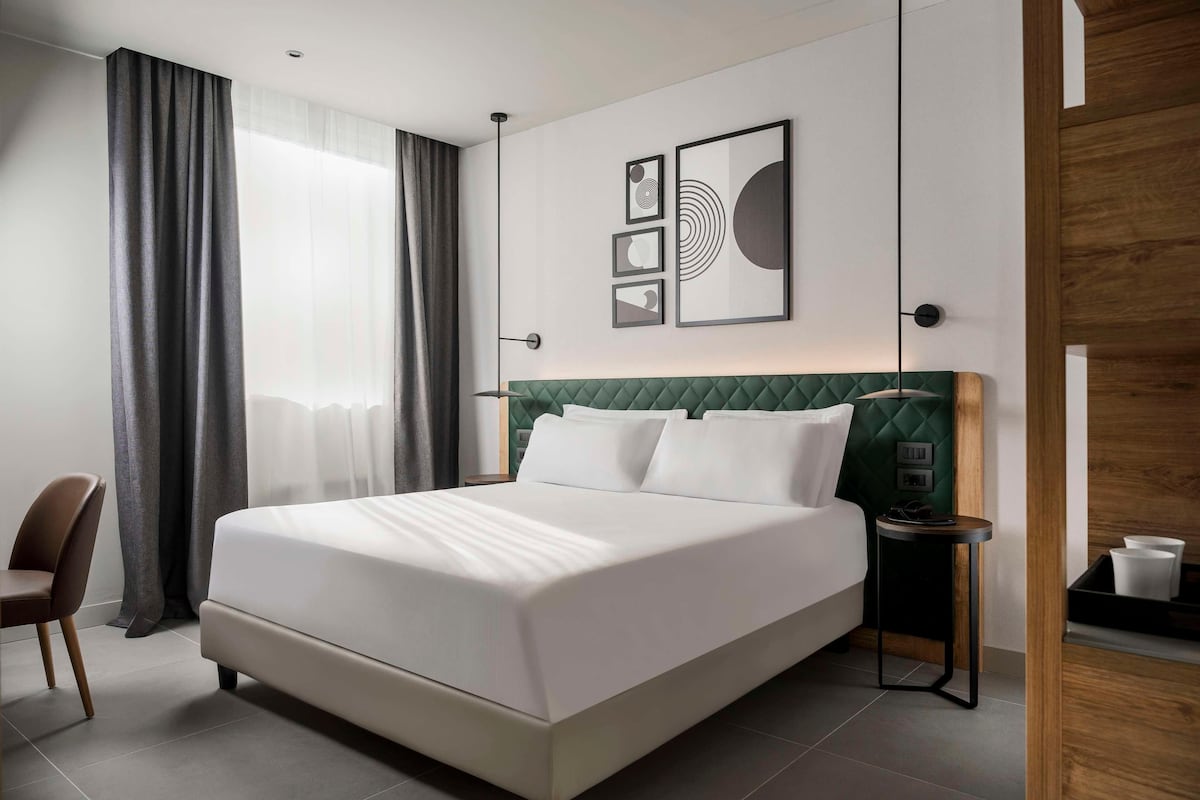Pillow-top beds, minibar, in-room safe, desk