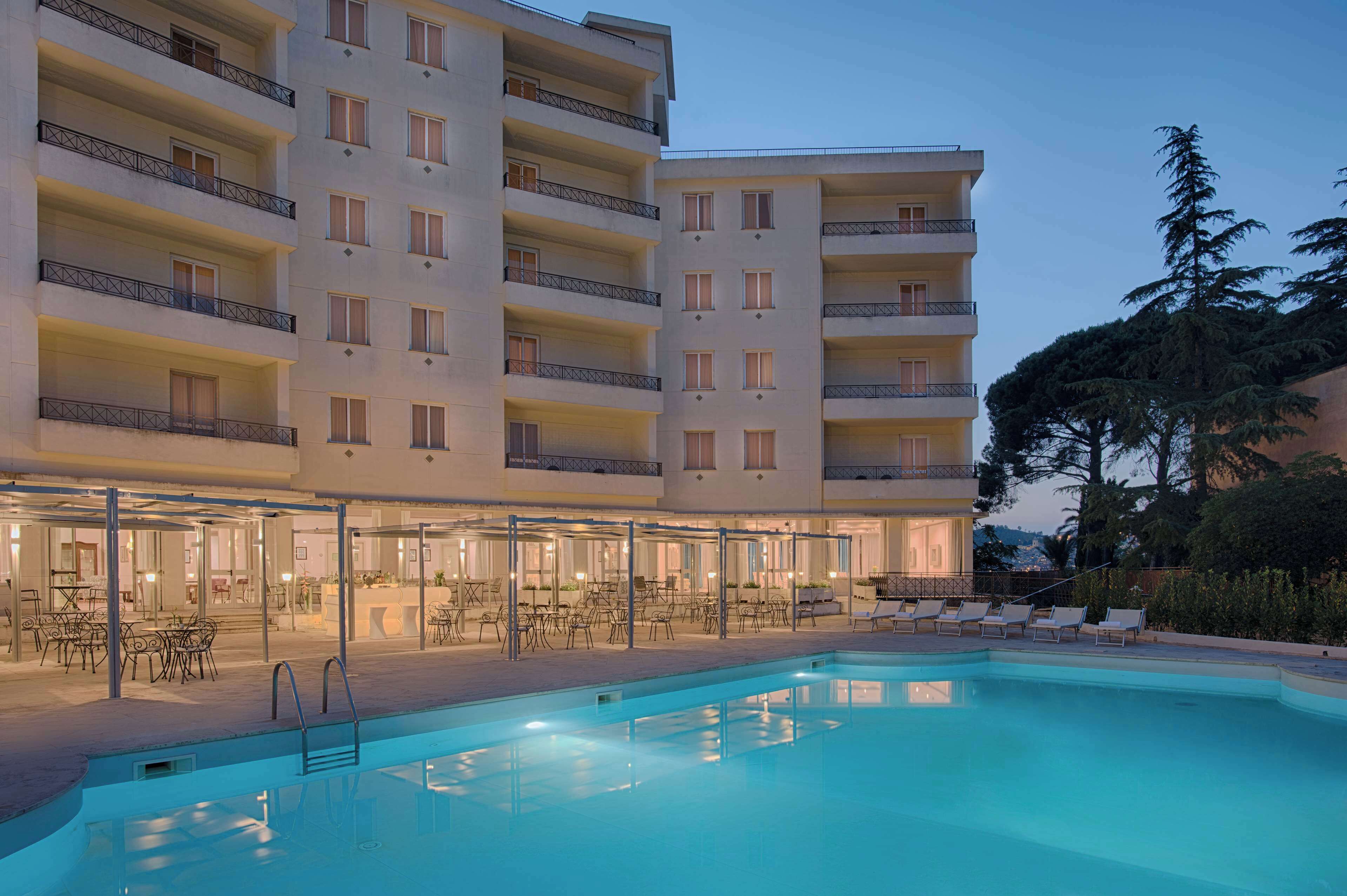 Seasonal outdoor pool, pool umbrellas, pool loungers