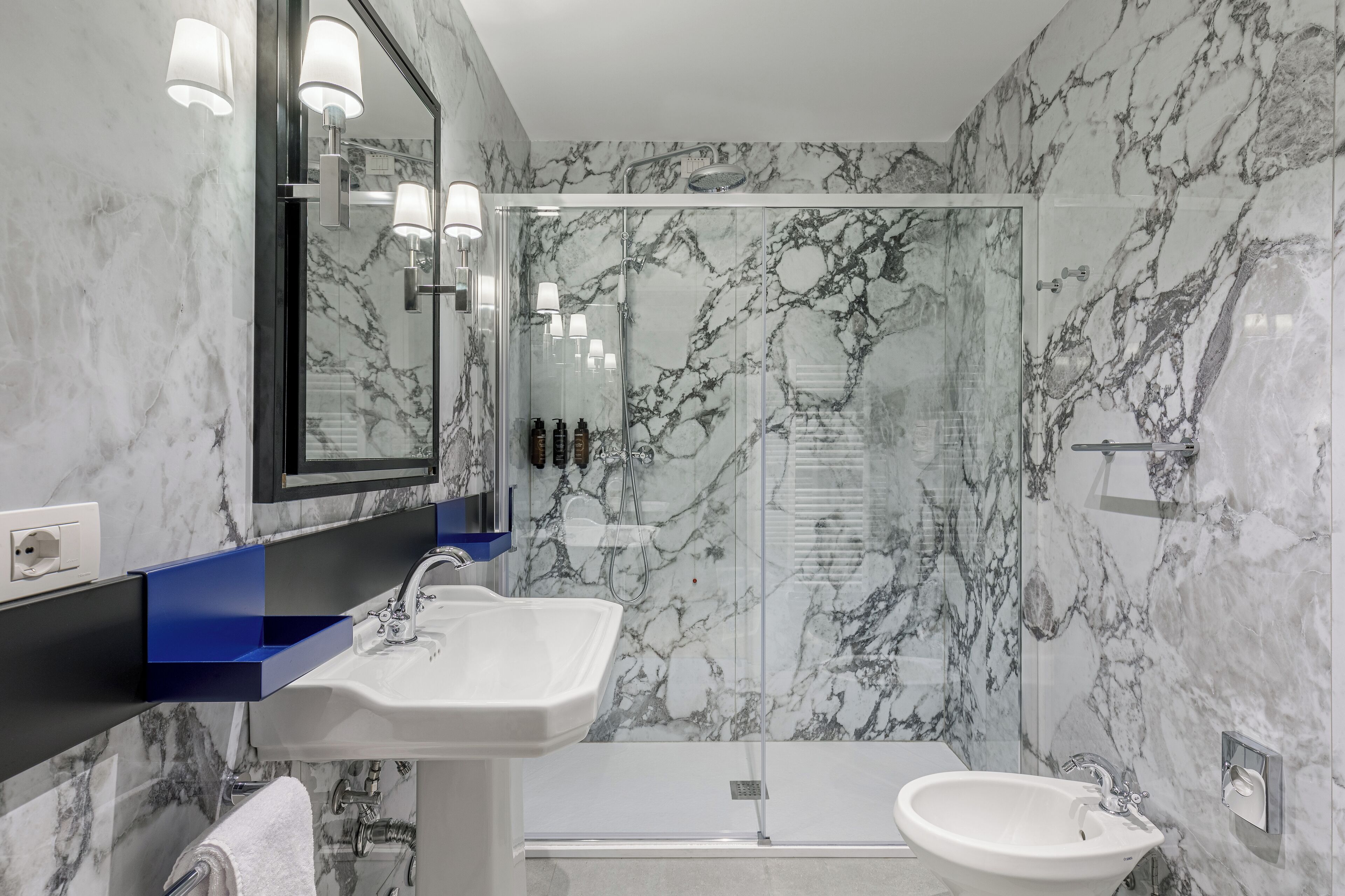 eco-friendly toiletries, hair dryer, towels