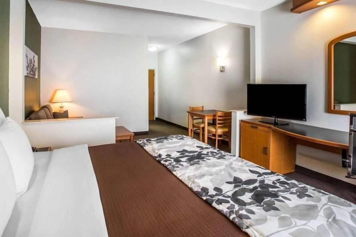 Desk, blackout drapes, iron/ironing board, rollaway beds