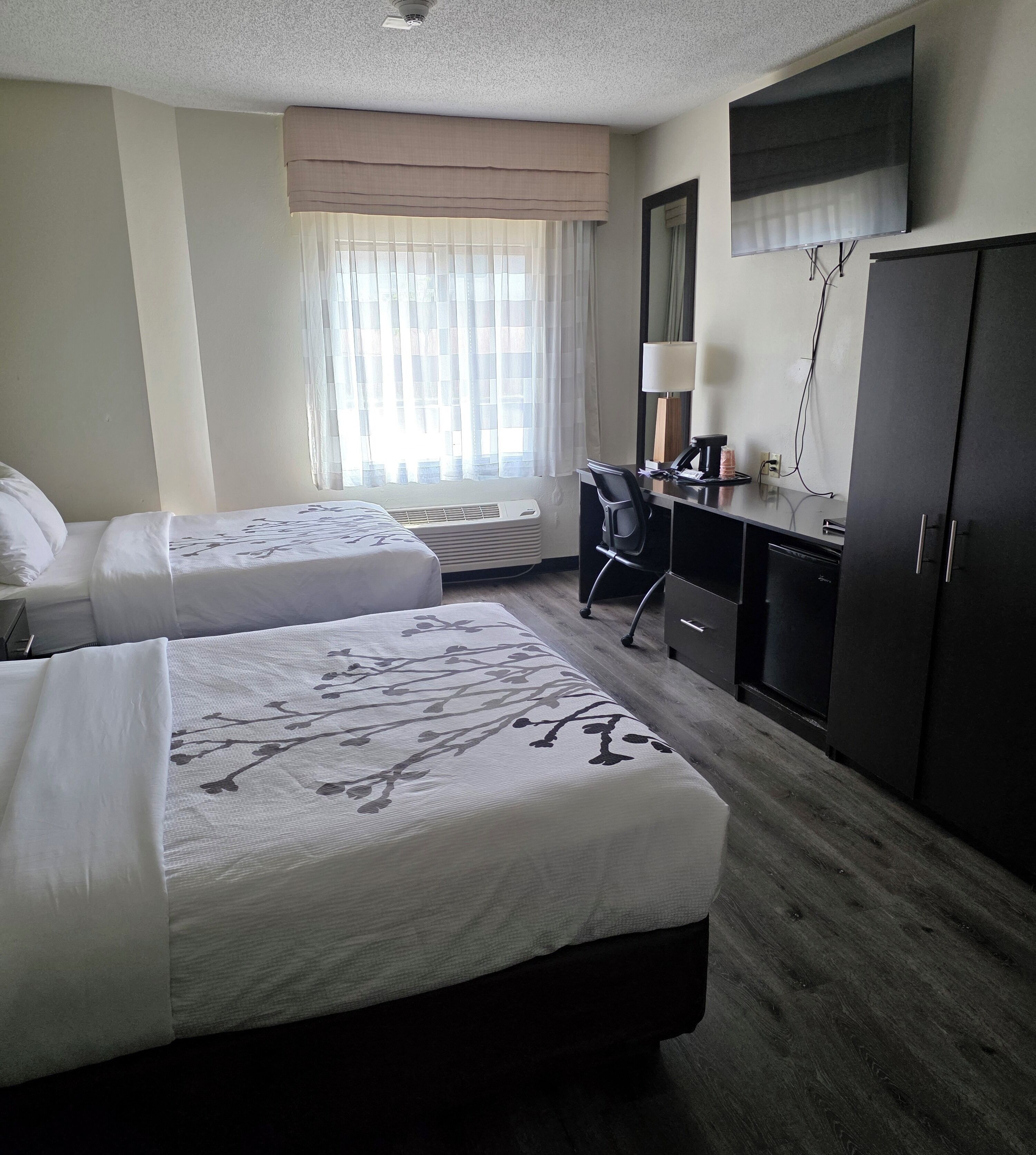 Standard room, 2 Queen beds | Premium bedding, desk, iron/ironing board, free WiFi