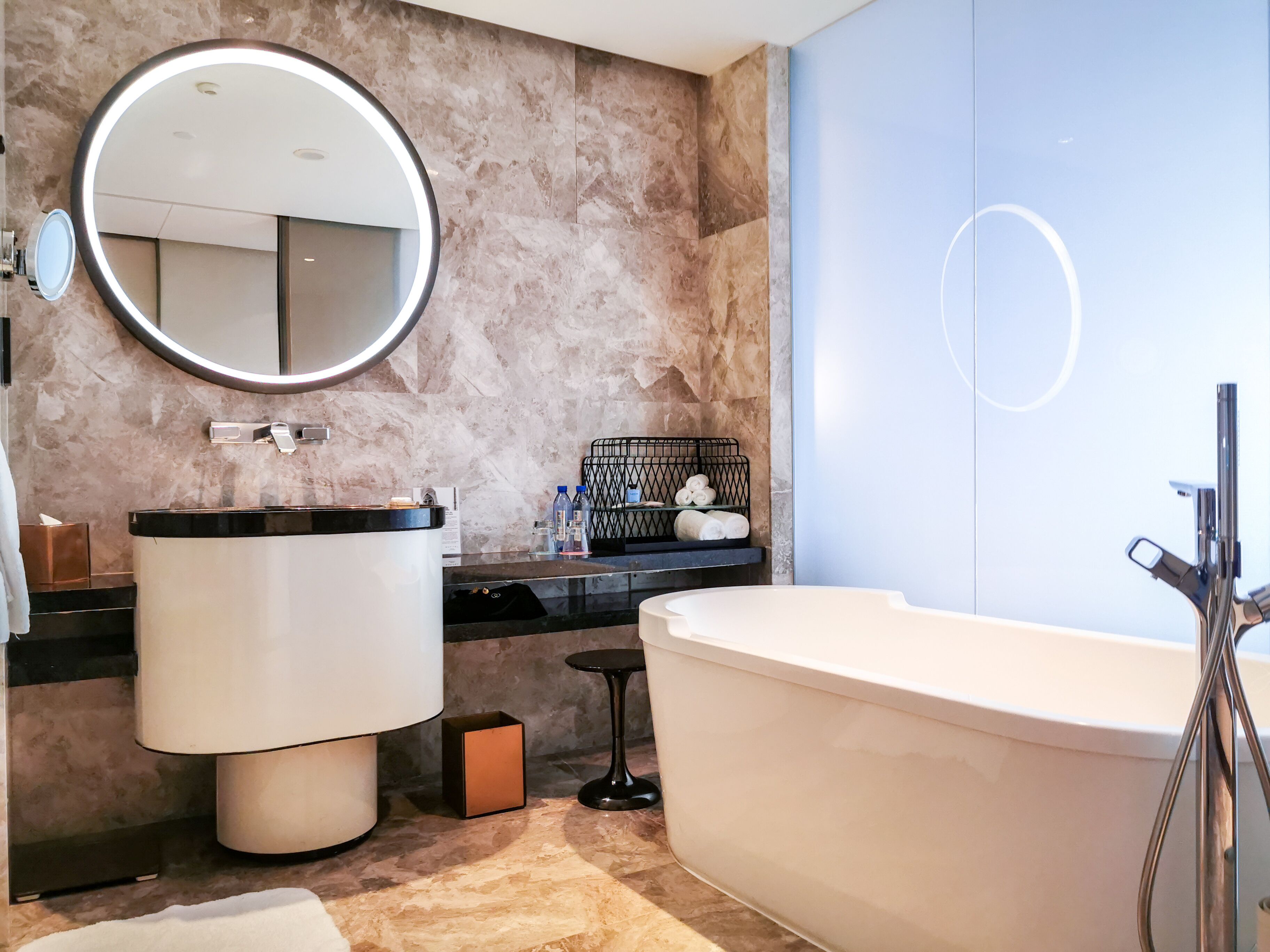 separate bathtub and shower, deep-soaking bathtub, rainfall showerhead