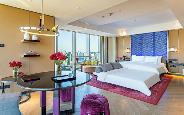 Premium bedding, down comforters, minibar, in-room safe