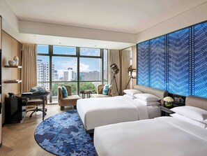 Premium bedding, down comforters, minibar, in-room safe