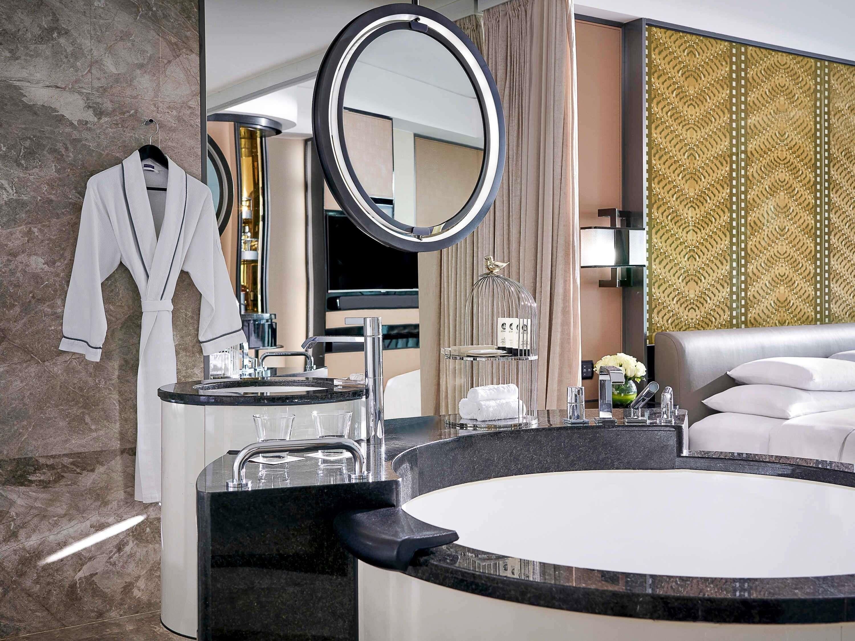 Premium bedding, down comforters, minibar, in-room safe