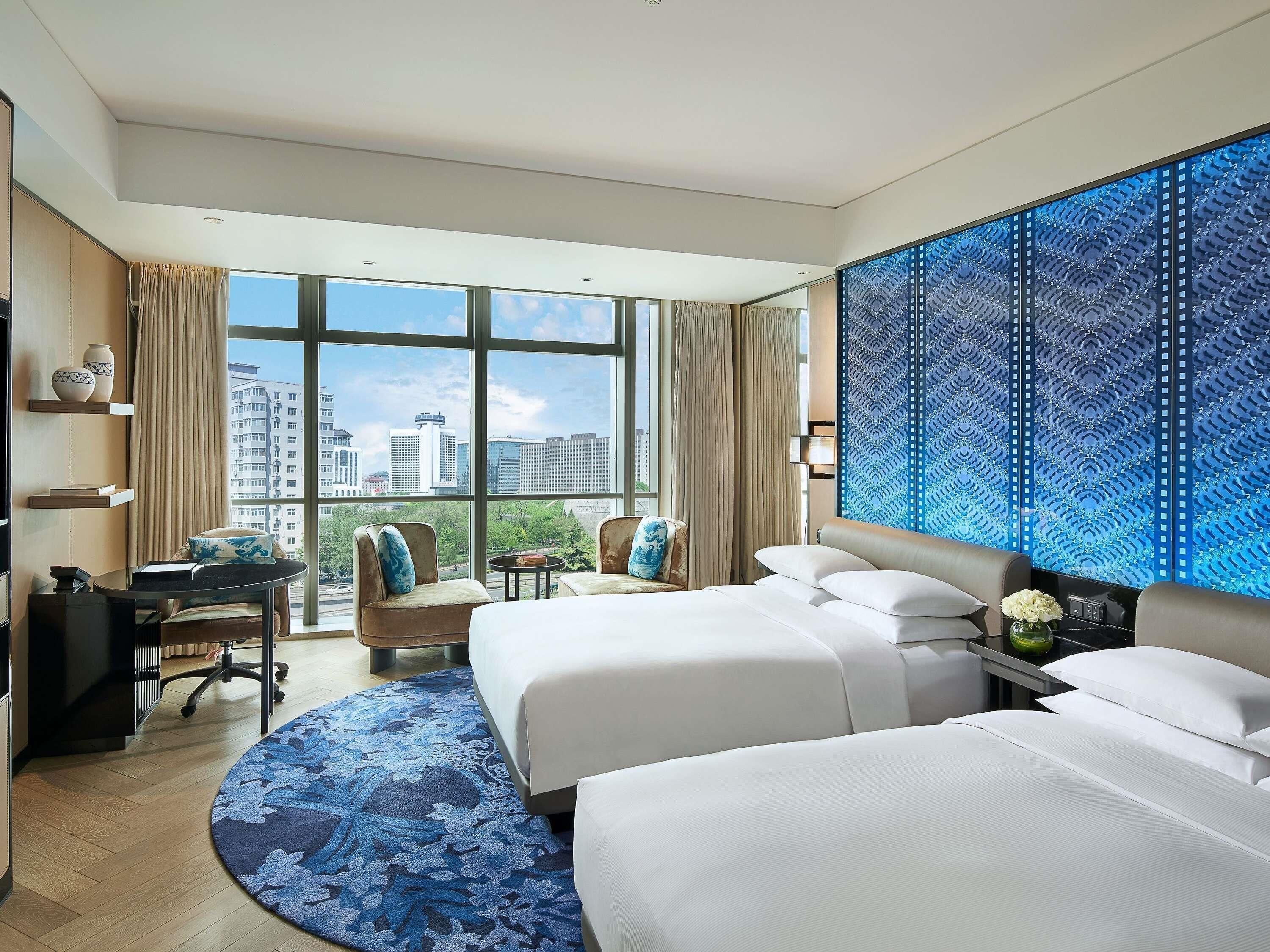 Premium bedding, down comforters, minibar, in-room safe