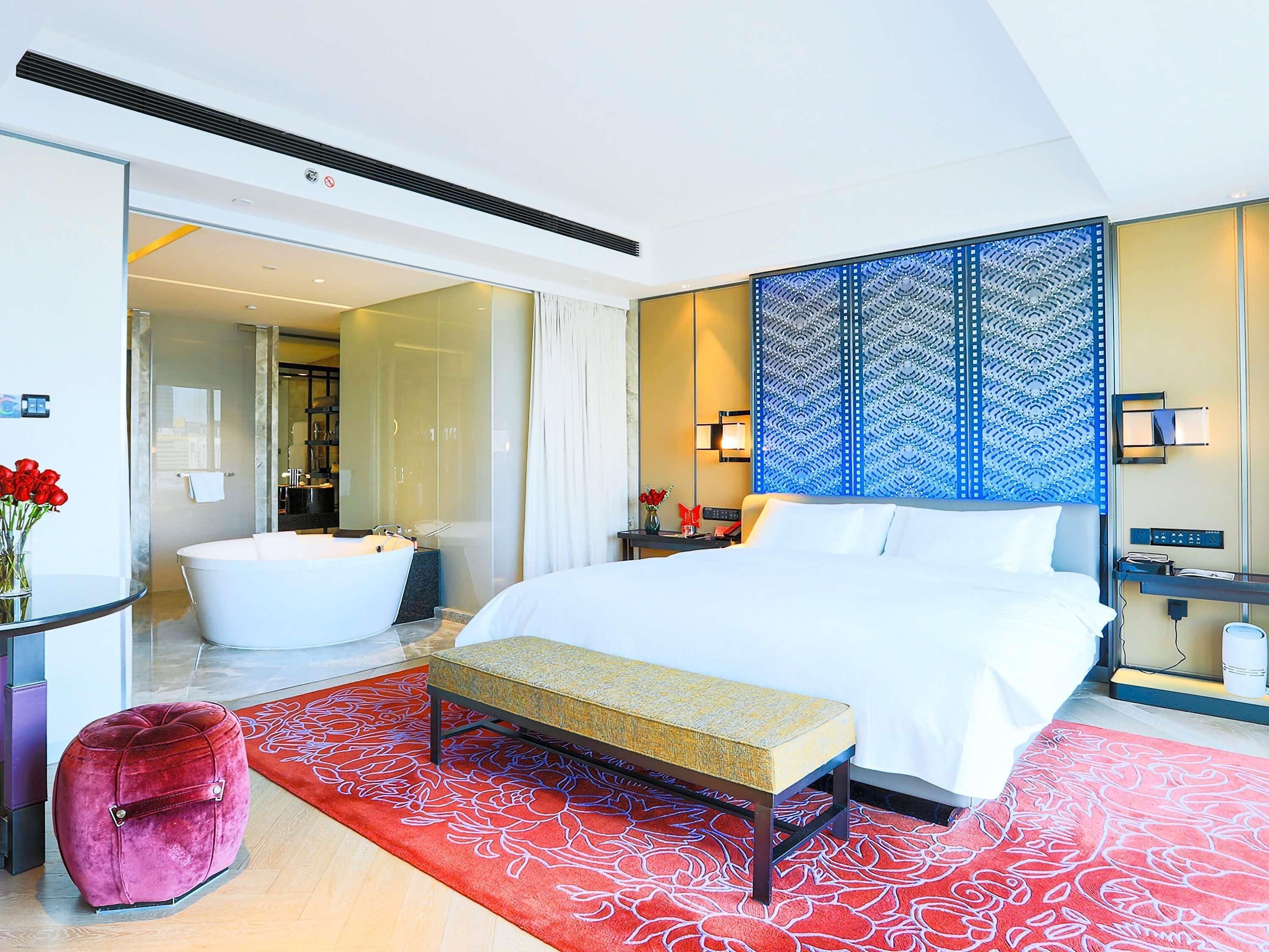 Premium bedding, down comforters, minibar, in-room safe