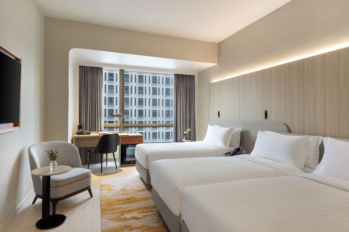 Deluxe Triple Room | 1 bedroom, minibar, in-room safe, desk