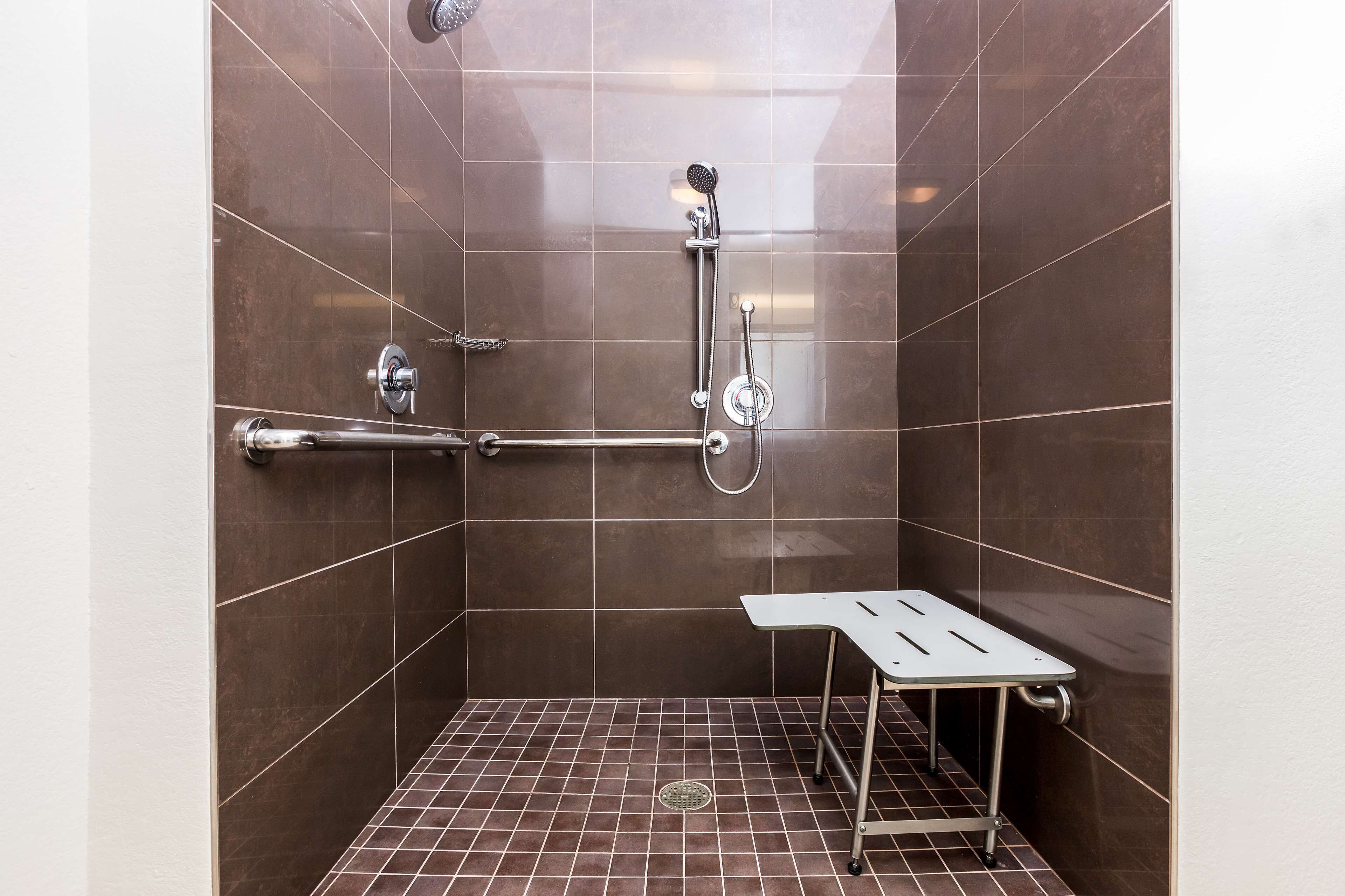 designer toiletries, hair dryer, towels