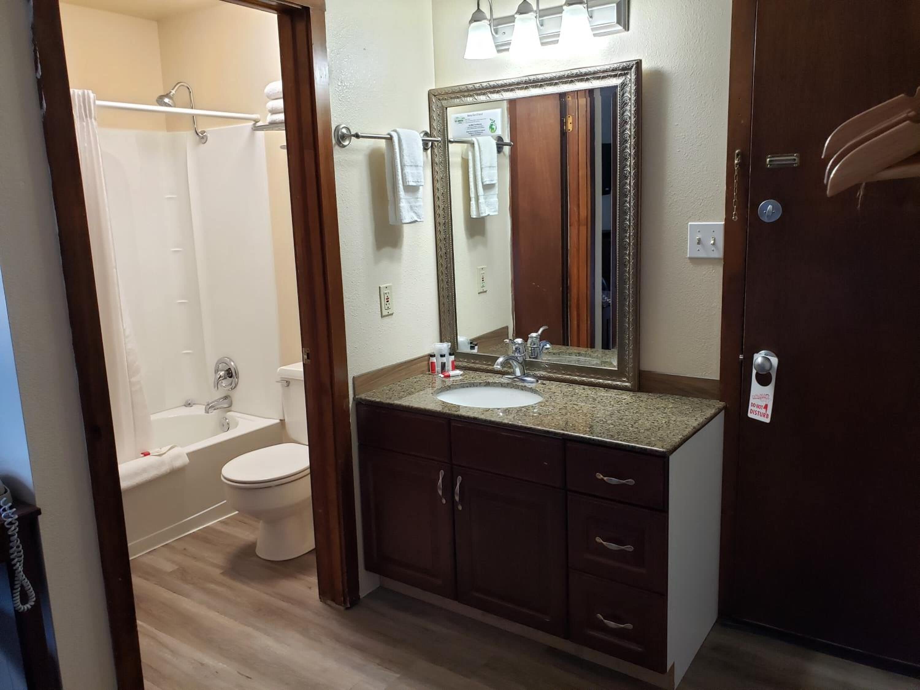 Separate tub and shower, towels