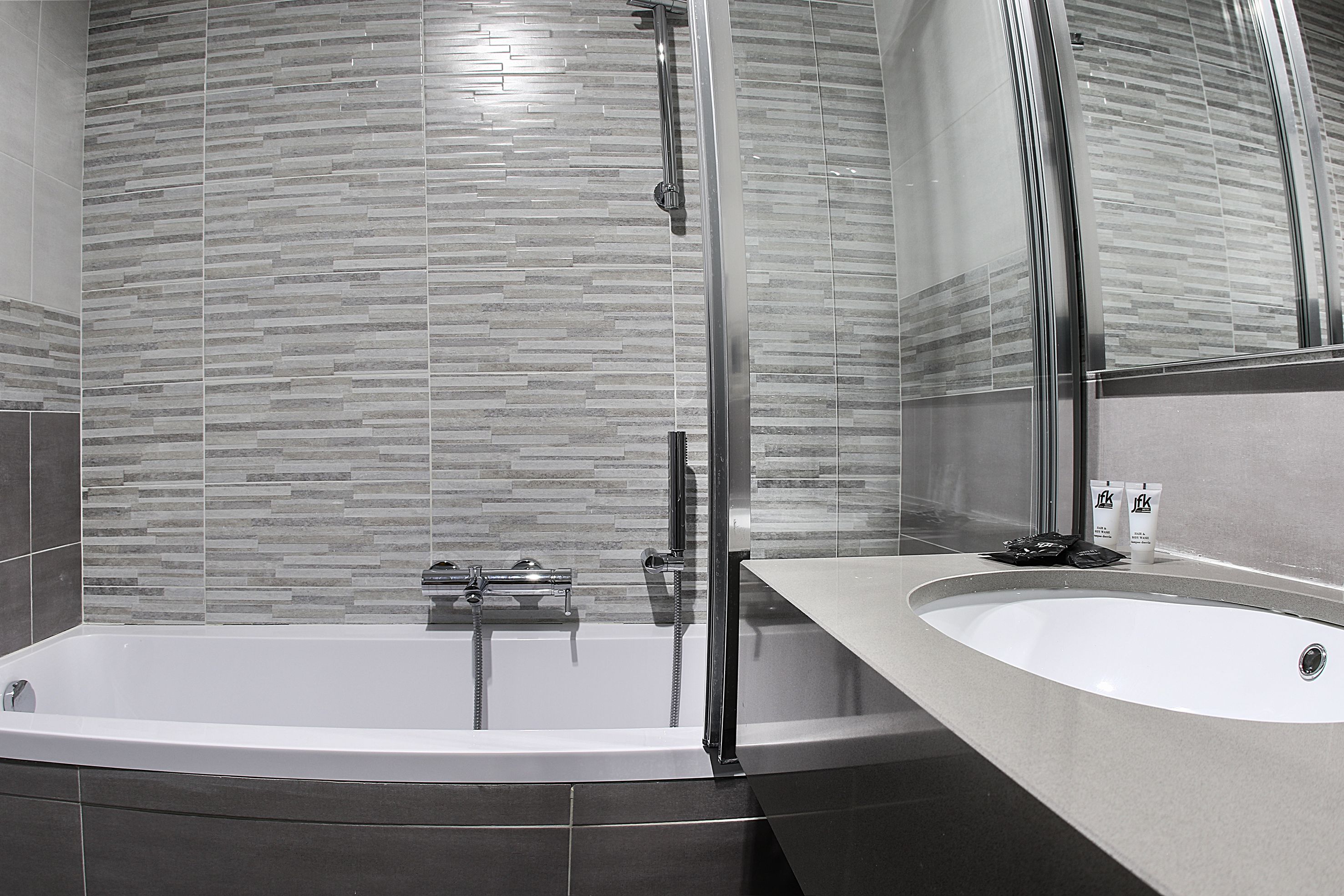 comfort room, 1 queen bed | bathroom | combined shower/bathtub, rainfall showerhead, free toiletries