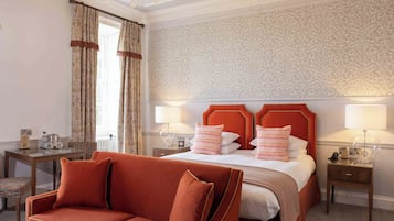 Premium bedding, down duvets, pillow-top beds, individually decorated