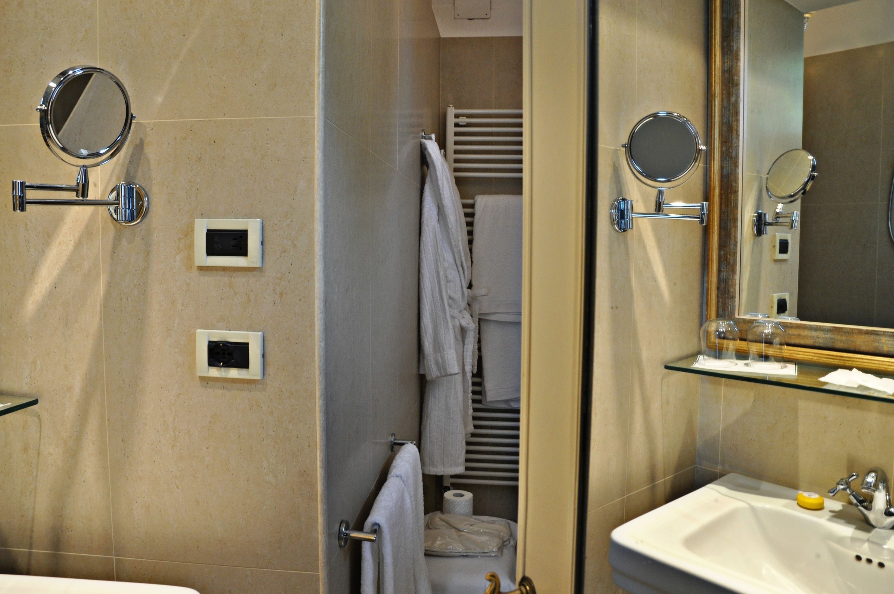 combined shower/bathtub, free toiletries, hair dryer, bathrobes