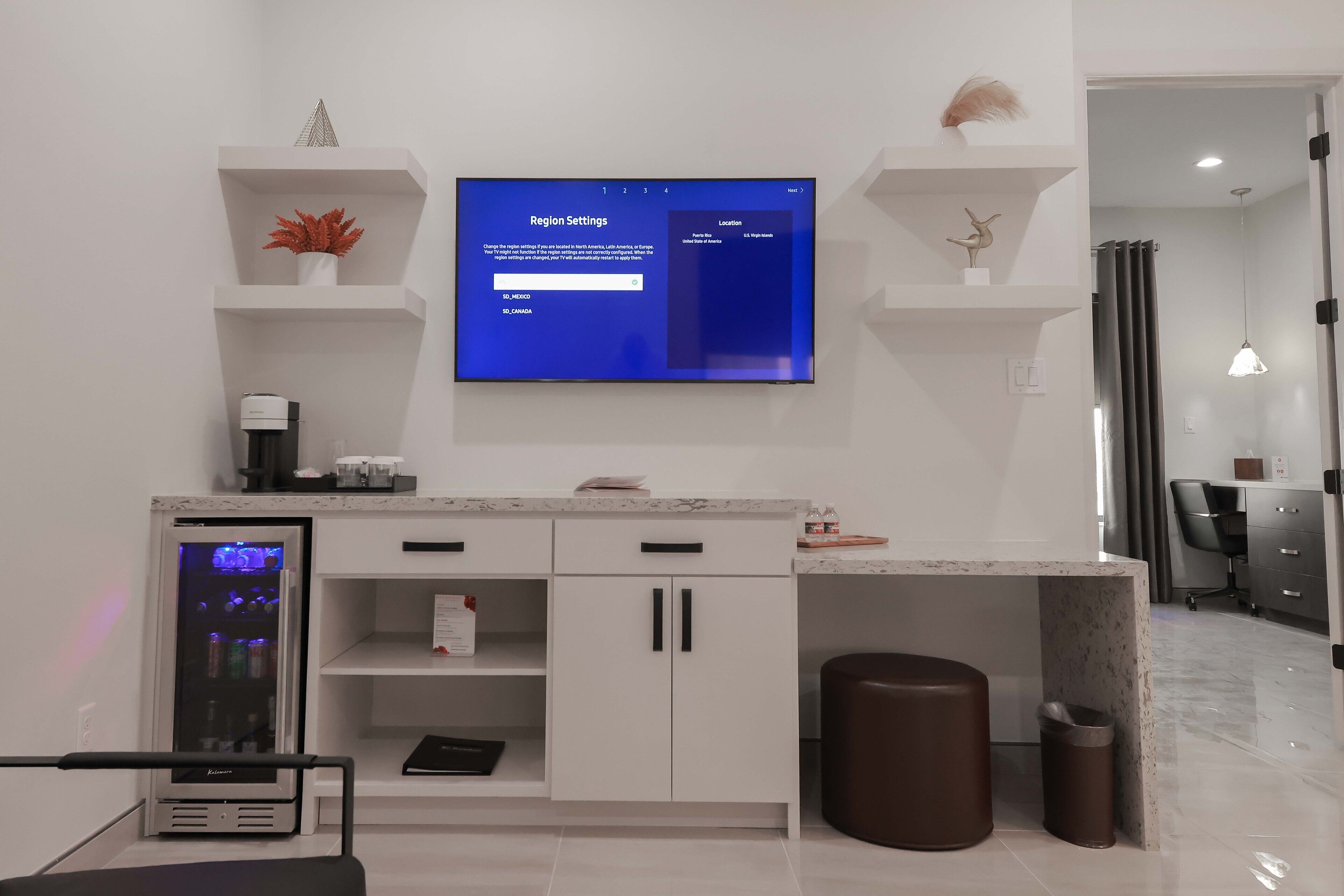 deluxe single room, 1 bedroom, private bathroom, garden view (deluxe suite) | living area | flat-screen tv