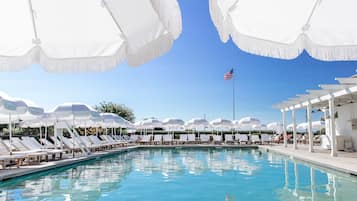 Seasonal outdoor pool, open 8 AM to 6:00 PM, pool umbrellas