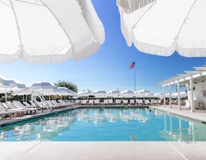 Seasonal outdoor pool, open 8 AM to 6:00 PM, pool umbrellas