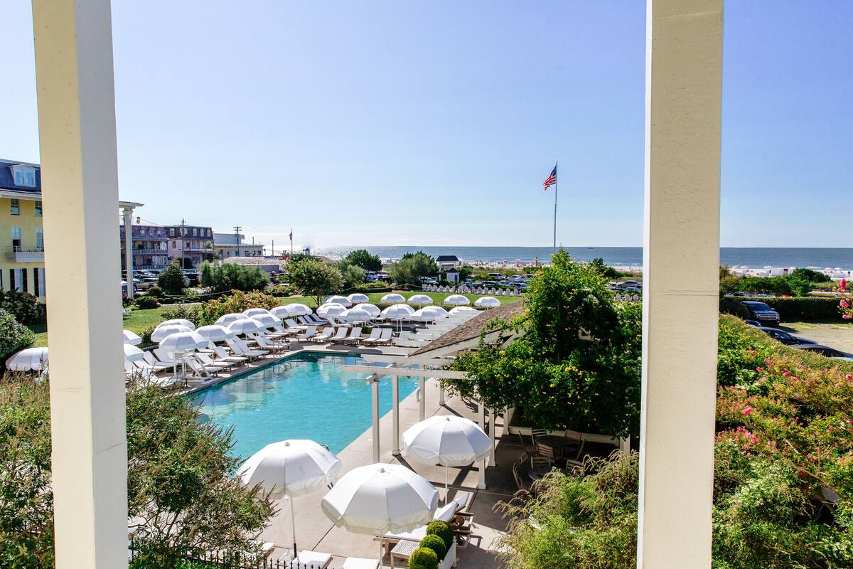 seasonal outdoor pool, open 8 am to 6:00 pm, pool umbrellas