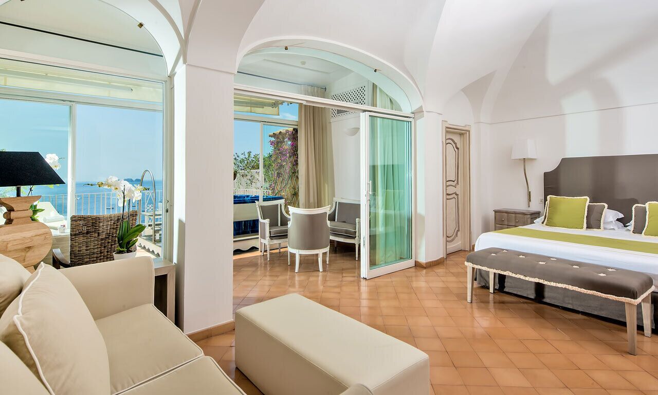 Junior Suite, Terrace, Sea View | Minibar, in-room safe, individually furnished, desk