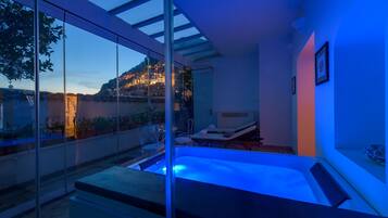 Deluxe Double Room, Patio | Minibar, in-room safe, individually furnished, desk