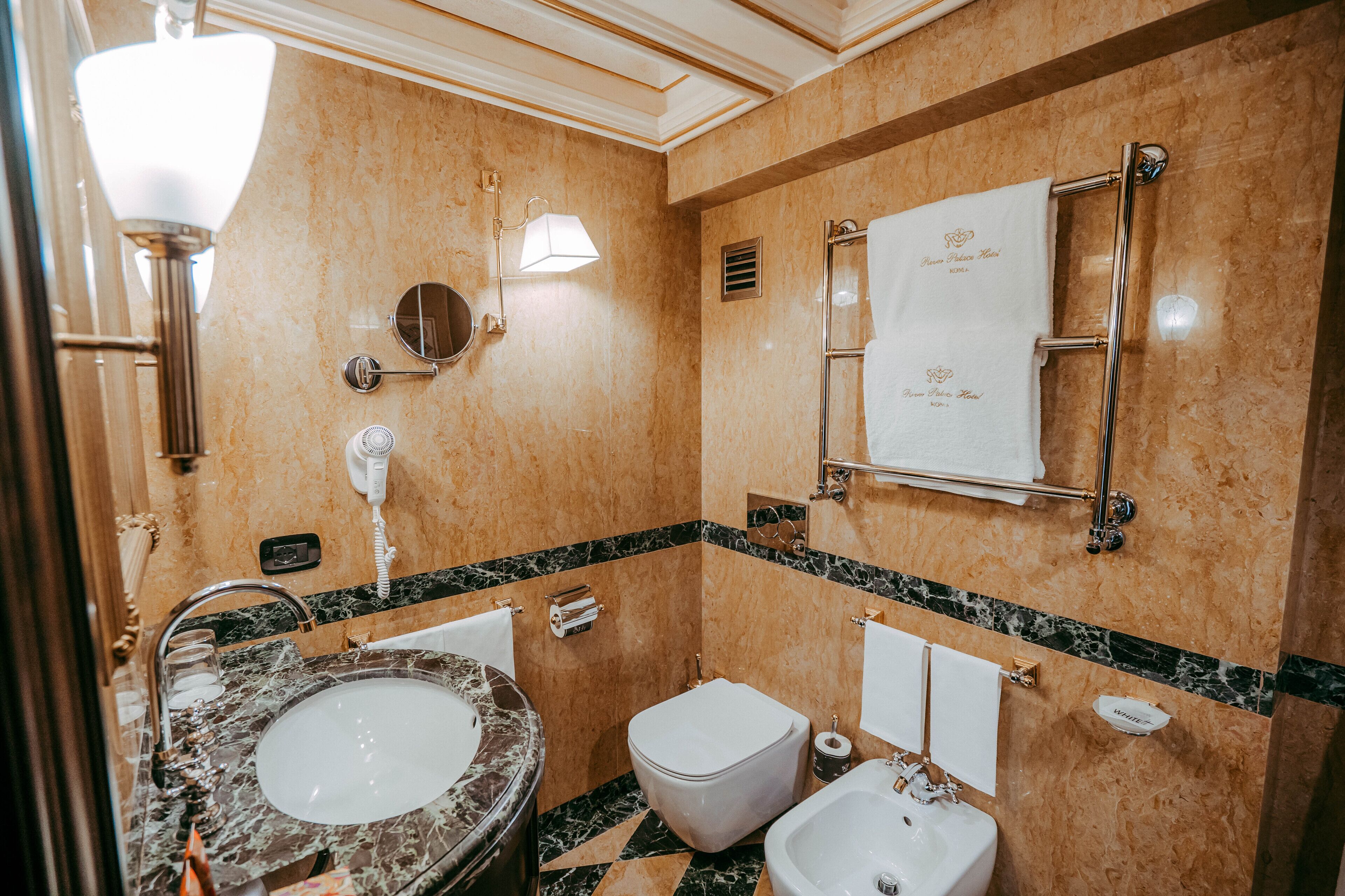 junior duplex | bathroom | hair dryer, bidet, towels