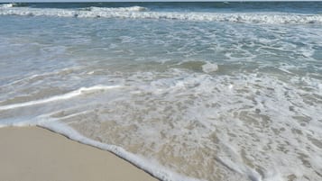 On the beach, white sand