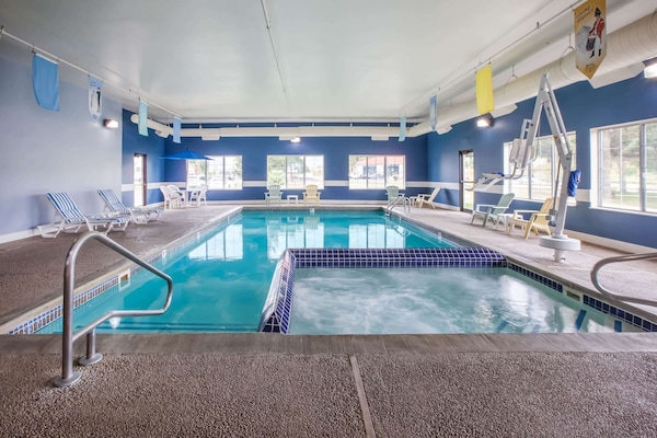 Indoor pool, open 9:00 AM to 11:00 PM, pool loungers