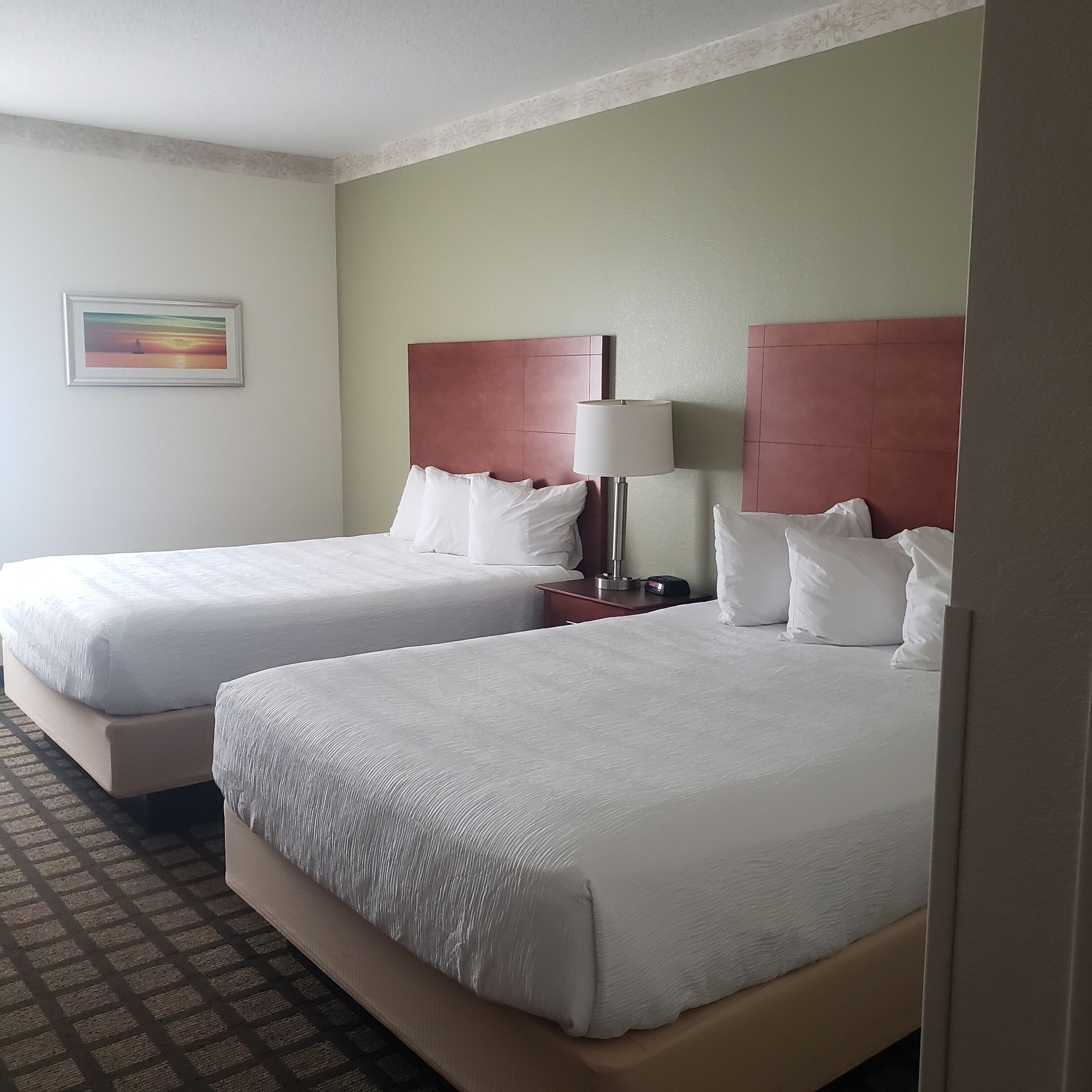 standard room, 2 queen beds | iron/ironing board, free cots/infant beds, free wifi, bed sheets