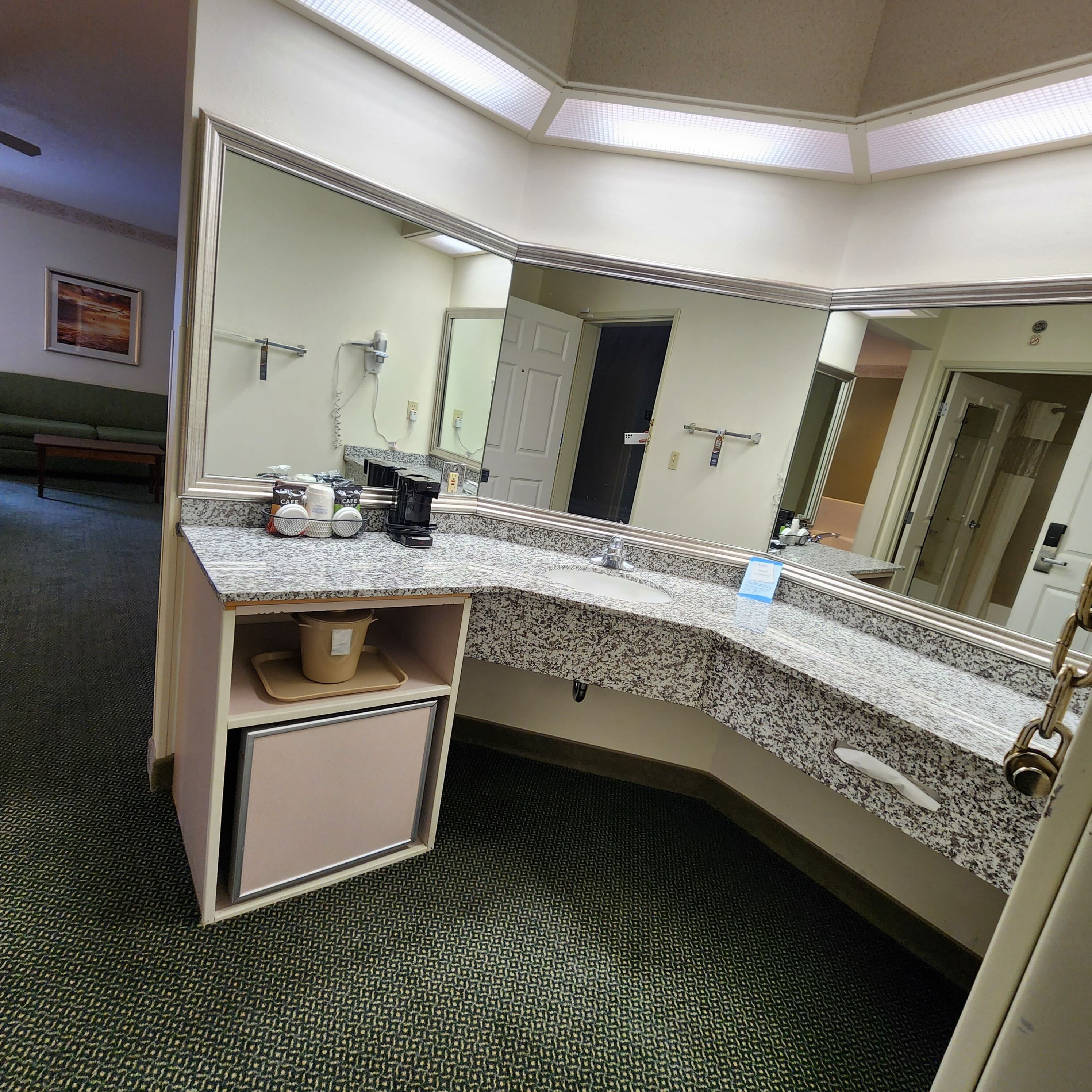 suite, 1 king bed, jetted tub | bathroom | combined shower/bathtub, free toiletries, hair dryer, towels