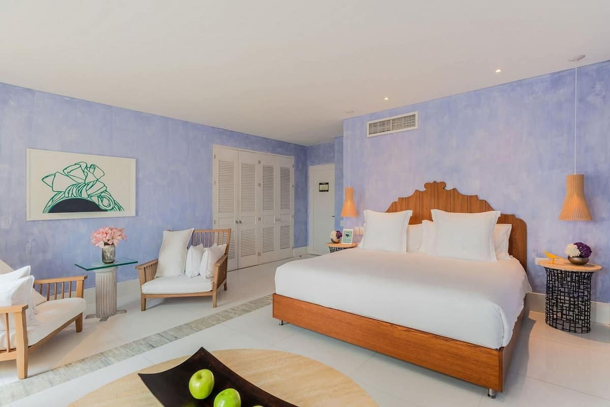 Frette Italian sheets, premium bedding, down duvets, minibar