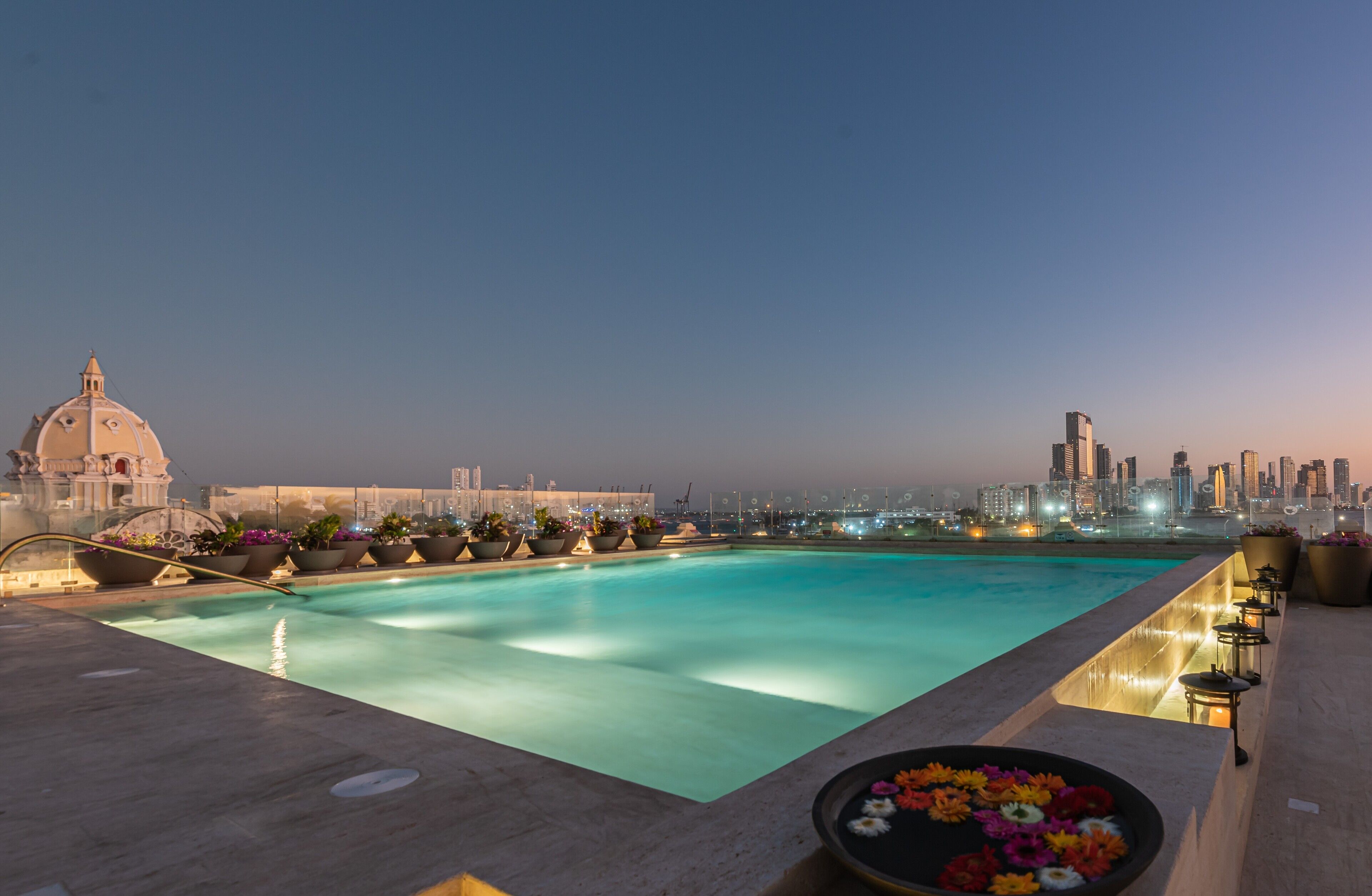 outdoor pool, open 7:00 am to 6:00 pm, pool umbrellas, pool loungers