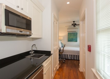414 Garden Cottage | Pillowtop beds, minibar, in-room safe, individually decorated at The Marquesa Hotel