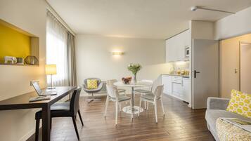 Apartment, 1 Bedroom | Living room | 26-inch LED TV with satellite channels, TV