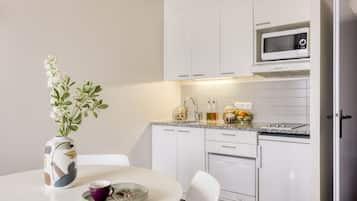 Apartment, 1 Bedroom | Private kitchen | Fridge, microwave, stovetop, dishwasher