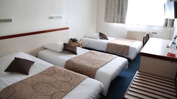 Standard Triple Room | Desk, blackout drapes, iron/ironing board, free WiFi