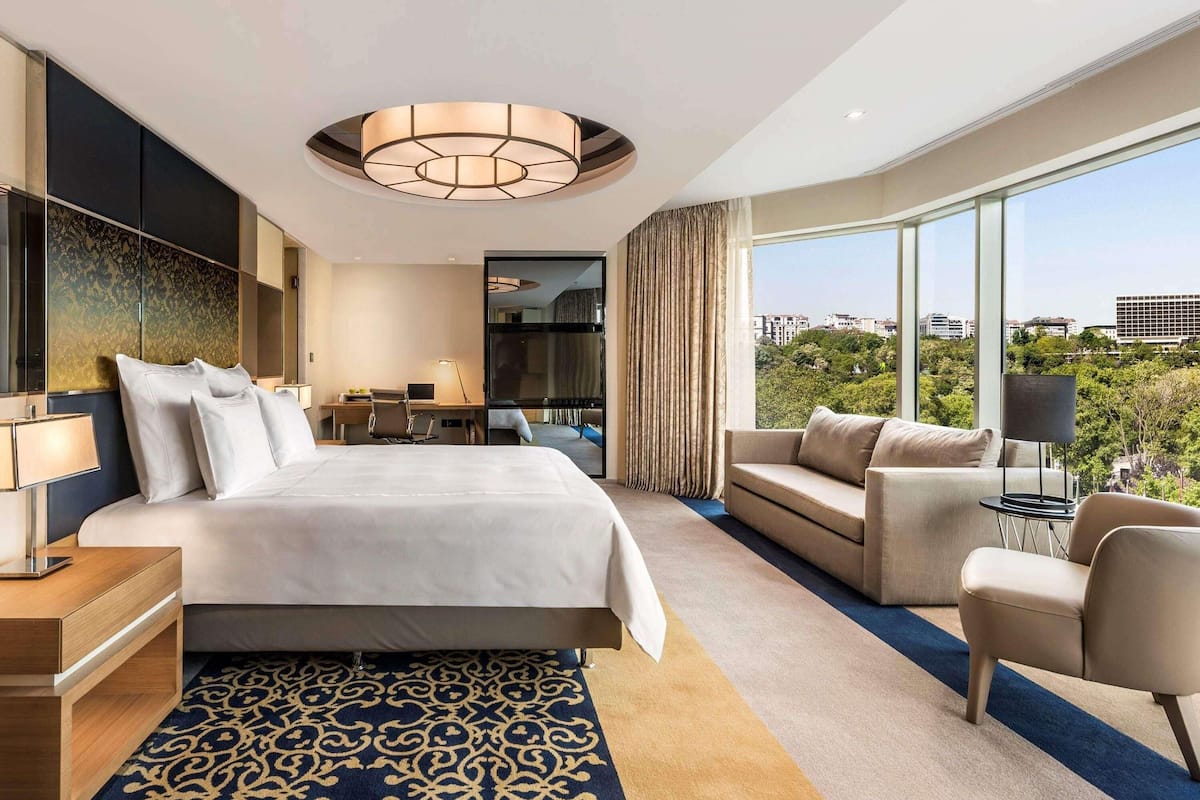 Swiss, Quarto executivo, 1 cama King, vista para o jardim, no canto | 1 quarto, roupas de cama antialérgicas, frigobar, cofres nos quartos