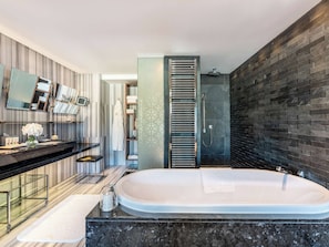 Hydromassage showerhead, designer toiletries, hair dryer, bathrobes