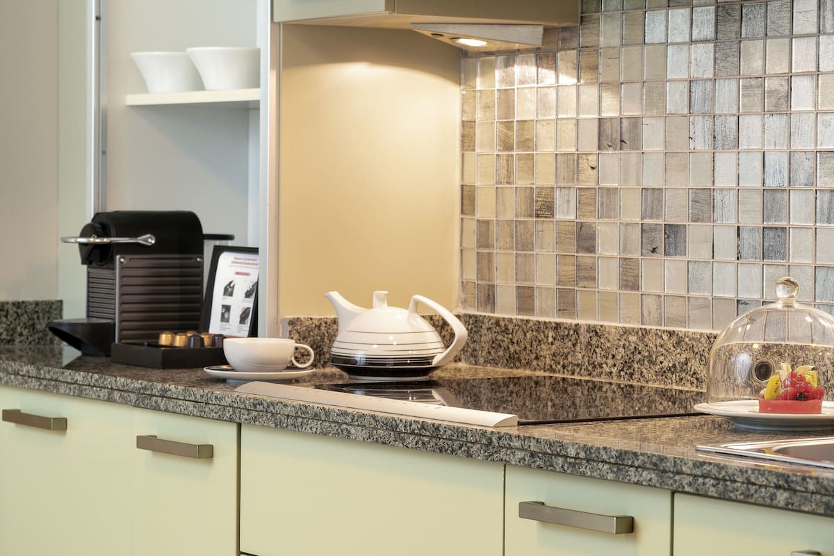 suite, multiple beds | private kitchenette | espresso maker, eco-friendly cleaning products