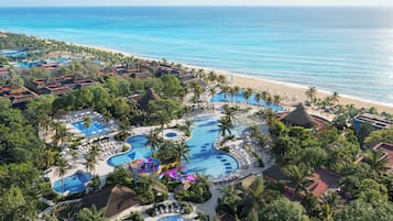 4 outdoor pools, open 7:00 AM to 7:00 PM, pool umbrellas, sun loungers