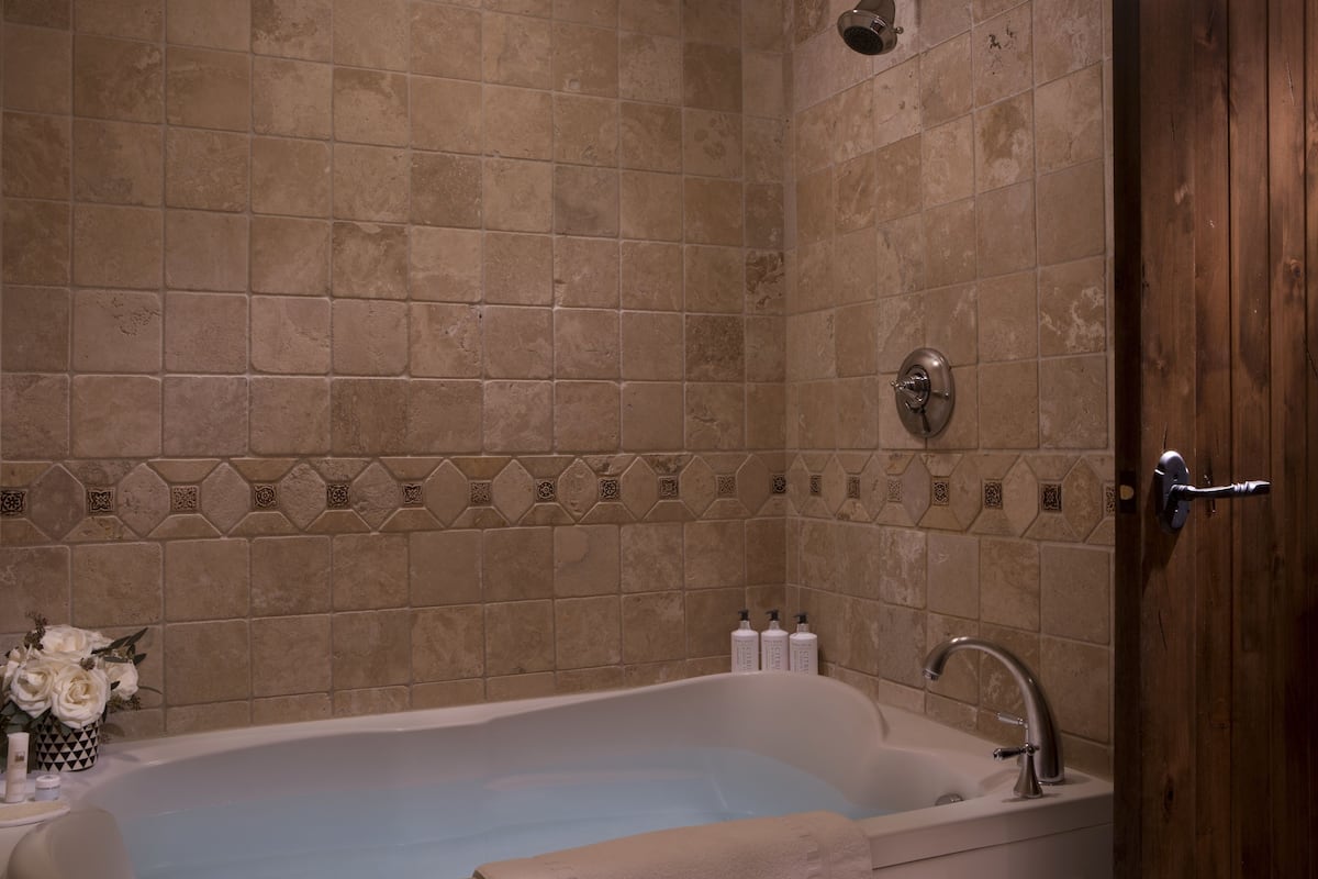 designer toiletries, hair dryer, bathrobes, towels