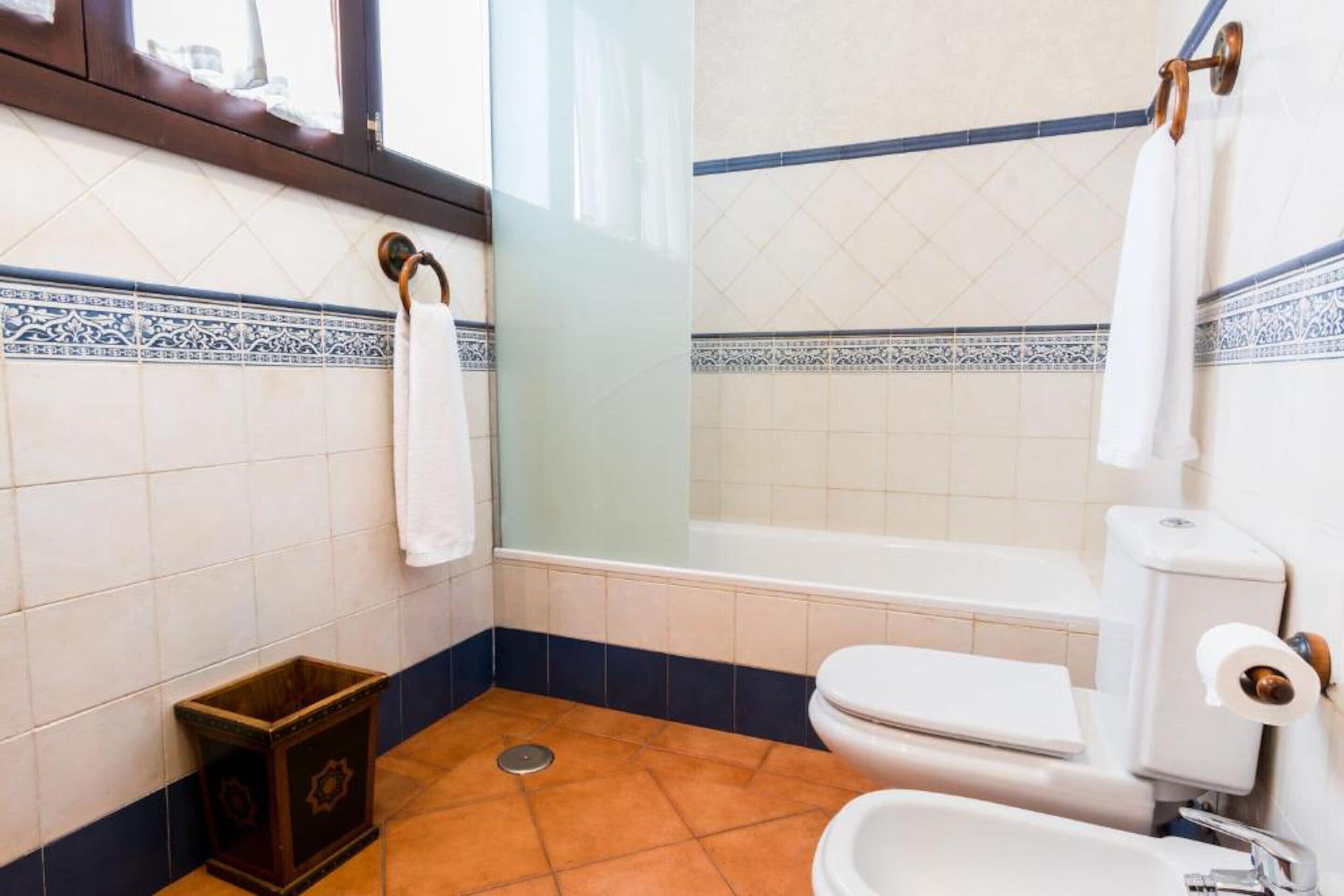 superior quadruple room (exterior) | bathroom | free toiletries, towels