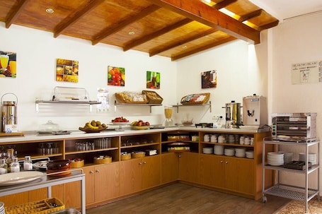 Área do café da manhã. Hostal Europa Punico