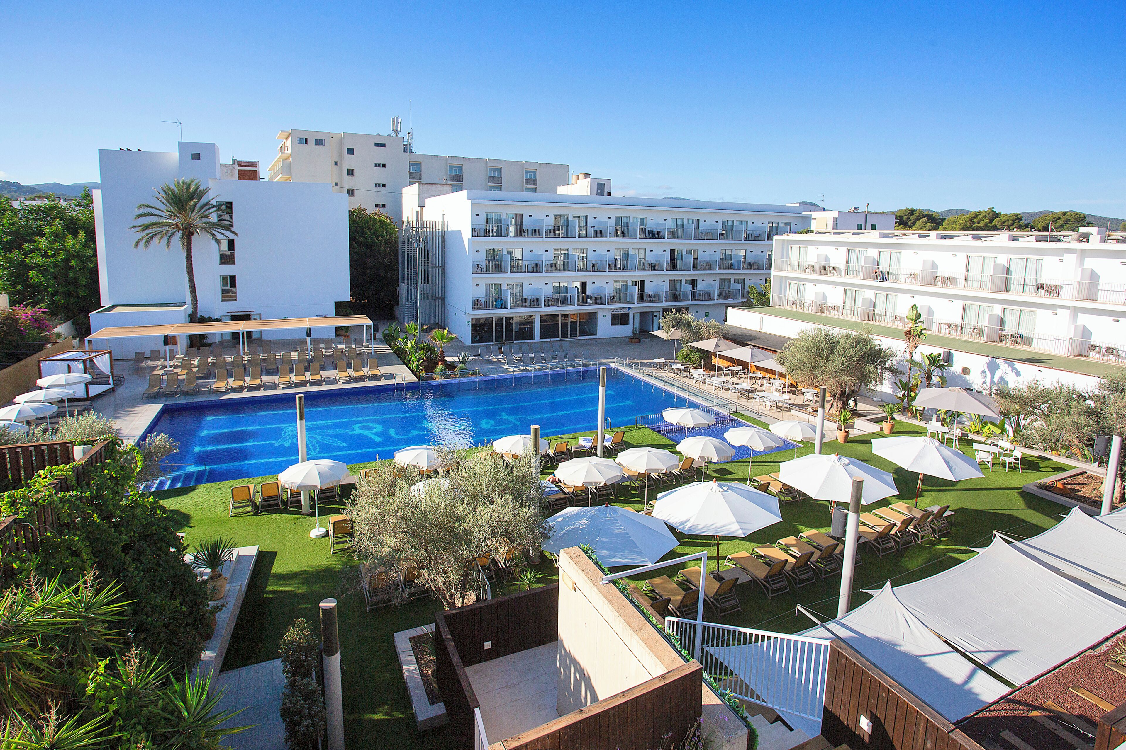 Seasonal outdoor pool, open 11:00 AM to 7:00 PM, pool umbrellas